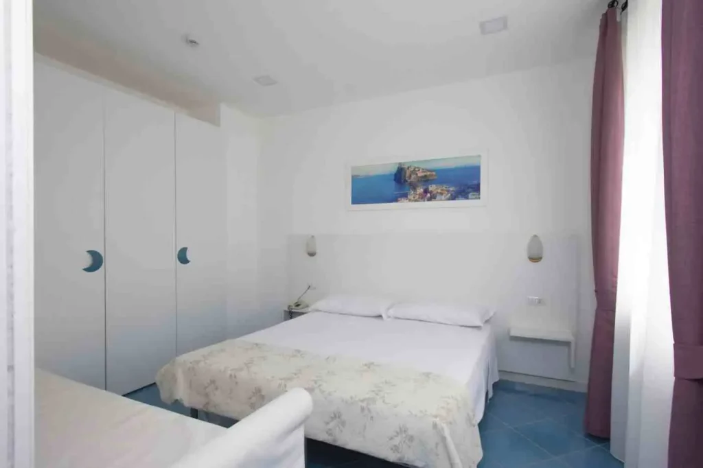 Family Room con balcone vista mare e letto matrimoniale